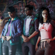 The new crew in the Saints Row Reboot pose together against a graffitied brick wall.